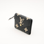 Portefeuille Victorine en cuir Monogram Empreinte noir et beige