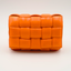 Sac Cassette matelassé en cuir Intreccio orange