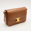 Sac Triomphe Classique en veau satiné bronze