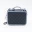 Sac Vanity Chanel en cuir Caviar et détails rayés bleu