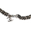 CHANEL – Ceinture chaîne métal argenté vieilli avec pendentif CC