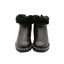 CHANEL – Bottine shearling & chaîne – Cuir noir / mouton