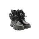 PRADA – Platform ankle boots with zip pockets – Black leather