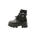 PRADA – Platform ankle boots with zip pockets – Black leather