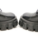 PRADA – Platform ankle boots with zip pockets – Black leather