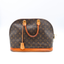 Sac Alma GM vintage en toile Monogram et cuir