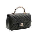 CHANEL – Mini Classic bag with handle in black lambskin & gold-tone metal