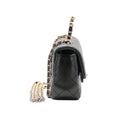 CHANEL – Mini Classic bag with handle in black lambskin & gold-tone metal