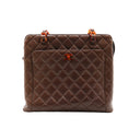 CHANEL – Sac Shopping vintage en cuir d’agneau chocolat (1994)