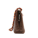 CHANEL – Sac Shopping vintage en cuir d’agneau chocolat (1994)