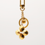 Porte-clé Flower dorée signé Louis Vuitton