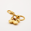 Porte-clé Flower dorée signé Louis Vuitton