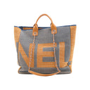 CHANEL – Oversized Logo Canvas & Leather Tote