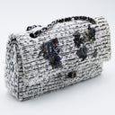 Chanel 2.55 bag in white embroidered tweed and jewelry