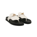 HERMES – Sandales plates Kelly blanc cassé
