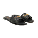 CHRISTIAN DIOR – Sandales plates ajourées noir et doré
