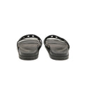 HERMÈS – Sandales plates Chypre noires en cuir