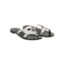 CHRISTIAN DIOR – Mules plates en cuir métallisé argenté serpent
