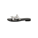 CHRISTIAN DIOR – Mules plates en cuir métallisé argenté serpent