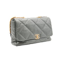 CHANEL – Sac Flap Maxi Matelassé Gris