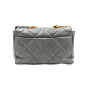 CHANEL – Sac Flap Maxi Matelassé Gris