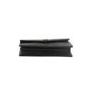 SAINT LAURENT – Pochette Cassandre en cuir grainé noir