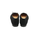 CHANEL – Ballerines matelassées en tissu et cuir noir