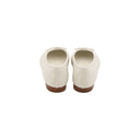 CHANEL – Ballerines matelassées en cuir blanc