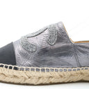 Chanel espadrilles in silver metallic leather and black canvas