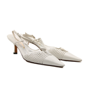 Escarpins Chanel vintage ajourés en cuir blanc