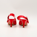 Dior red patent leather pumps
