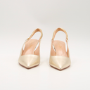 Dior gold slingback pumps
