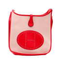 Sac Hermès Évelyne en toile beige et cuir rouge