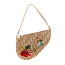 DIOR Saddle Bag in beige monogram canvas embroidered with flowers