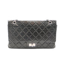 CHANEL 2.55 Reissue en cuir vieilli noir et métal argenté