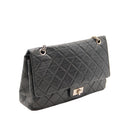 CHANEL 2.55 Reissue in black aged leather and silver-tone metal