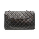 CHANEL 2.55 Reissue in black aged leather and silver-tone metal