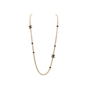 CHANEL – Sautoir CC en métal doré et résine chocolat A23