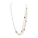 CHANEL – Gold-tone metal, pearl, and resin belt/necklace A20