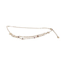 CHANEL – Gold-tone metal, pearl, and resin belt/necklace A20