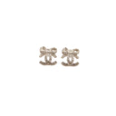 CHANEL – CC bow rhinestone earrings