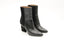 Boots Hermès en cuir et daim noir