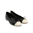 CHANEL – Ballerine bicolore – Noir / ivoire