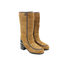 CHANEL Bottes pony hair fauve, cuir noir et chaînes entrelacées